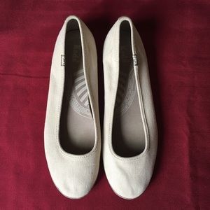 Women’s slip on Keds shoes.